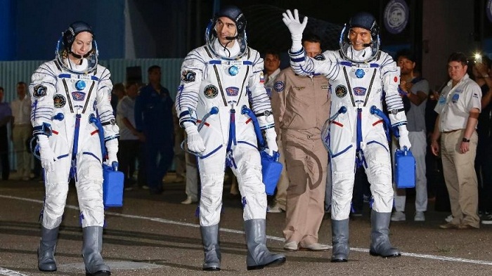 American astronaut, two others back on Earth after 115 days in space 